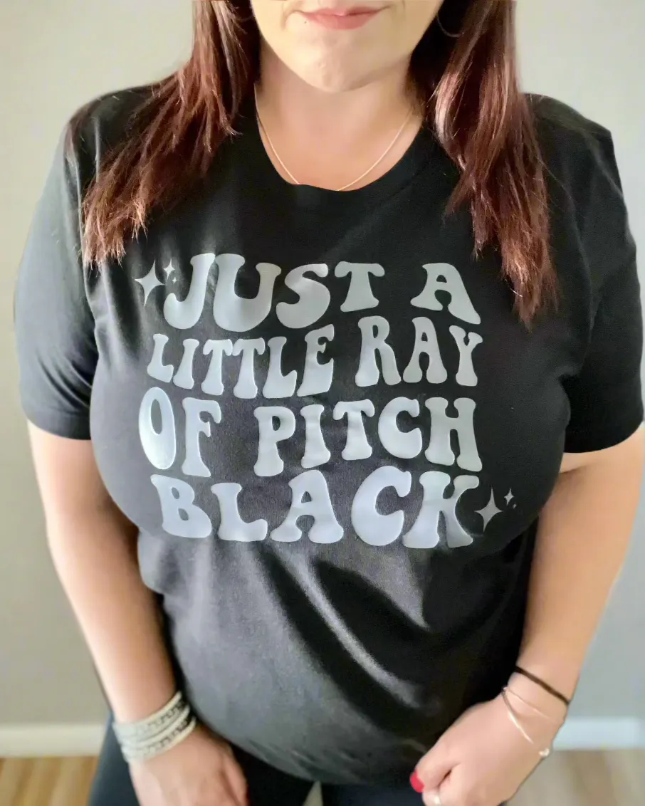 just a little ray of pitch black | graphic top